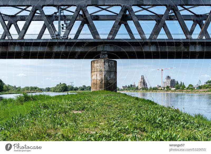 Railroad bridge over the Elbe near Magdeburg Railway bridge Bridge pier Detail River Crossing Exterior shot Deserted Sky Transport Traffic infrastructure