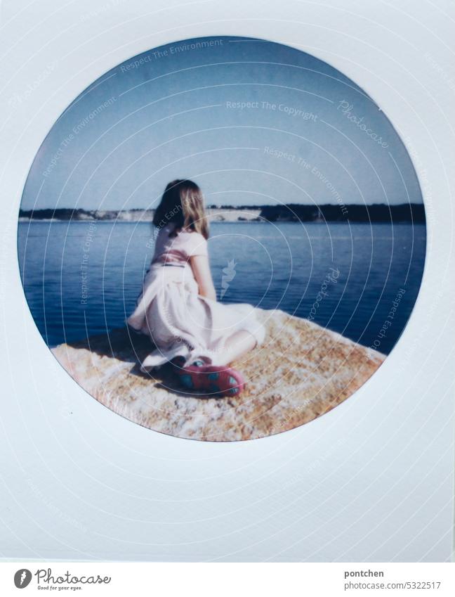 a girl sits on a rock and looks out to sea. vacation Ocean Looking outlook Adriatic Sea lure tranquillity holidays Vacation & Travel Water Sky coast Blue