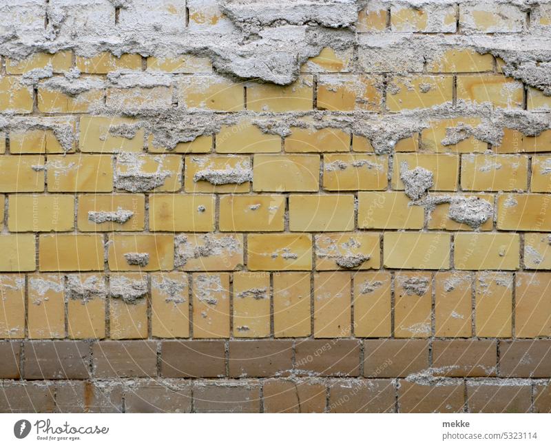 crumbling plaster Wall (barrier) Facade Wall (building) House (Residential Structure) Building Town Old Gloomy Old town Stone wall clinker clinker facade