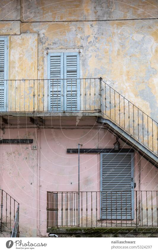 façade Facade block of flats Town Manmade structures skyscrapers Architecture houses Building Apartments House (Residential Structure) Wall (barrier) Plaster