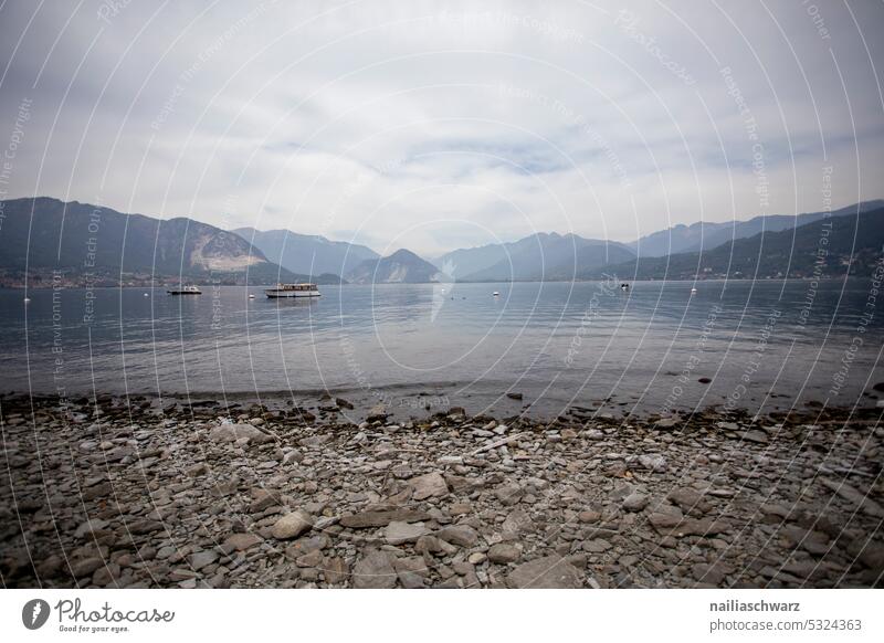 Lake Maggiore Ascona Water Lago Maggiore Calm Loneliness Tourism Relaxation Mountain range Summer Vacation & Travel Trip Colour photo Old Deserted Exterior shot