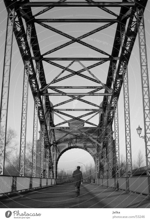 walk on Man Adults Bridge Lanes & trails Coat Steel Going Gray Black White Elbbrücke Steel carrier Black & white photo Steel bridge Rear view To go for a walk 1