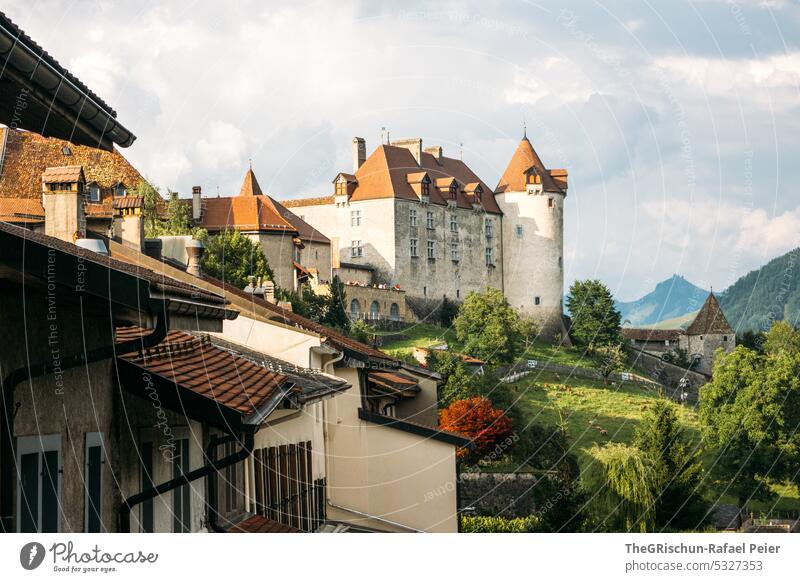 Castle with houses in foreground gruyer Lock Switzerland Tourism Roof roofs Sky Building House (Residential Structure) Architecture Historic gruyere