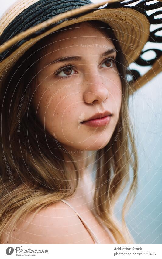 Woman in sunhat admiring seascape woman model straw hat rest summer vacation portrait female travel tourism trip journey holiday weekend relax chill ocean water