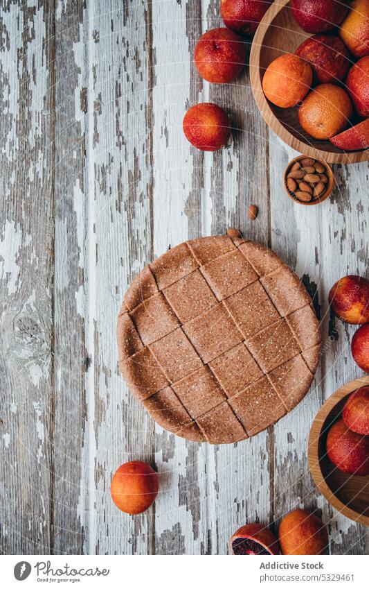 Delicious homemade blood orange pie on table citrus baked delicious vegan fruit food sweet vegan pie appetizing whole dessert almond blood orange cake