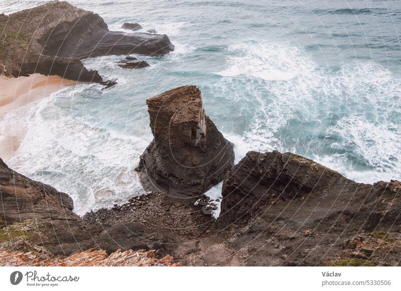 Breathtaking beach of Praia da Manteiga with its high cliffs near Vila Do Bispo, Algarve, Portugal. Wandering the Rota Vicentina. Crossing the west coast