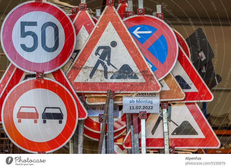 Overload Sign forest Road sign Colour photo Signs and labeling Exterior shot Signage Warning sign Transport Safety Lanes & trails Motoring Arrangement Cycling