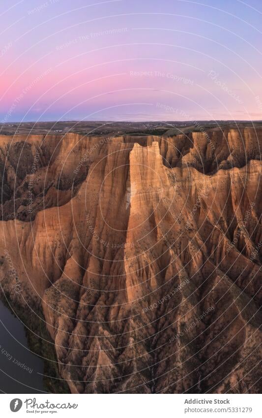 Drone view of amazing naturally formed mountains picturesque landscape canyon river nature environment valley cliff highland rocky scenery water stone terrain