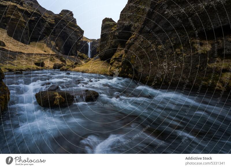 Amazing waterfall in rocky terrain landscape mountain woods iceland forest scenery seljalandsfoss kvernufoss flow stream nature scenic wild highland stone