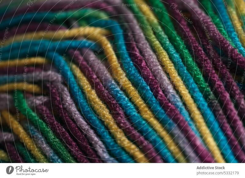 Multicolored wool threads texture multicolored natural fiber warm yarn soft decorative craft hobby knitting clothes textile handicraft creativity colorful woven