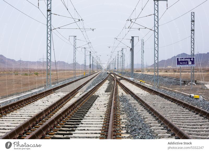 Railroad tracks on railway station line power platform railroad steel junction electric industry modern public contemporary logistic engineering transit