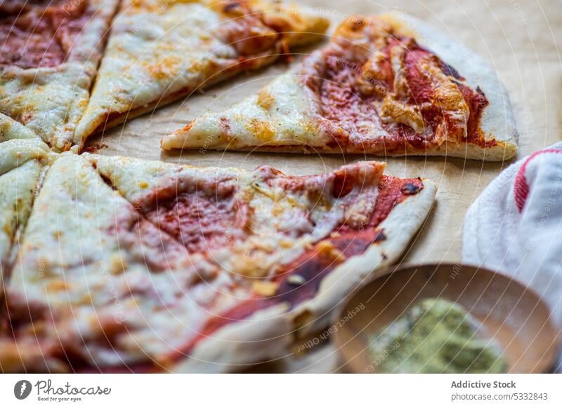 Fresh baked homemade pizza Italy Margherita cheese cuisine dough eat eating food fresh gourmet handmade herb italian lunch margarita meal paper slice spice