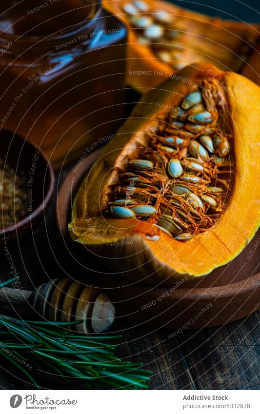 Raw pumpkin and ingredients bake baking board cook cooking coriander cube dish food fresh garlic healthy herbs lunch meal organic raw seed served set setting