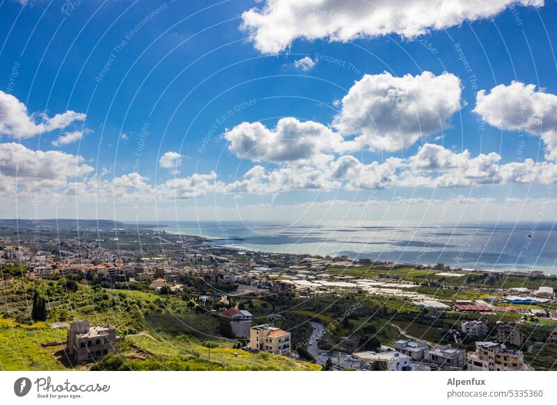 Day at the sea Clouds Ocean Landscape suburban Sky Water Blue coast Nature Horizon Exterior shot Colour photo Beautiful weather Far-off places Summer Weather