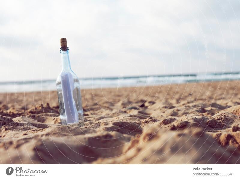 #A0# Message in a bottle Letter (Mail) communication Neck of a bottle Bottle lid genie in the bottle Colour photo Deserted Glass Close-up Island coast