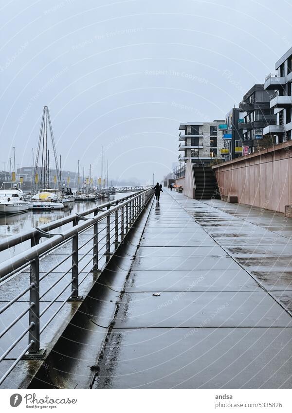 Port building on a gray, dreary day in the rain Harbour Rain Gray Gloomy Wet Harbor buildings Port area Water Exterior shot Colour photo Navigation Day