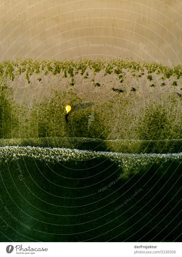 Bird's eye view of waves and beach with buoy in Brittany I Long shot Bird's-eye view Deep depth of field Contrast Shadow Light Copy Space top Copy Space bottom