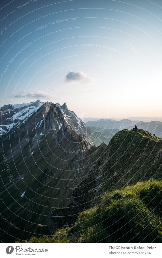 Mountains with atmospheric sky Rock Switzerland appenzellerland Stone Hiking touristic Exterior shot Tourism Colour photo Alpstein Nature Sun Grass