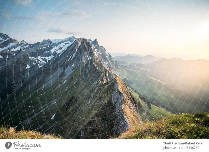 Bergen in sunset Rock Switzerland appenzellerland Stone Hiking touristic Exterior shot Tourism Mountain Colour photo Alpstein Nature Sun Grass tourist region