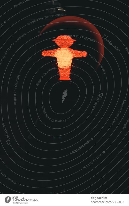 On the road in the history of the world.  Traffic light man with hat indicates stop. ampelmännchen Road sign Safety Pictogram Wait Traffic infrastructure Signal