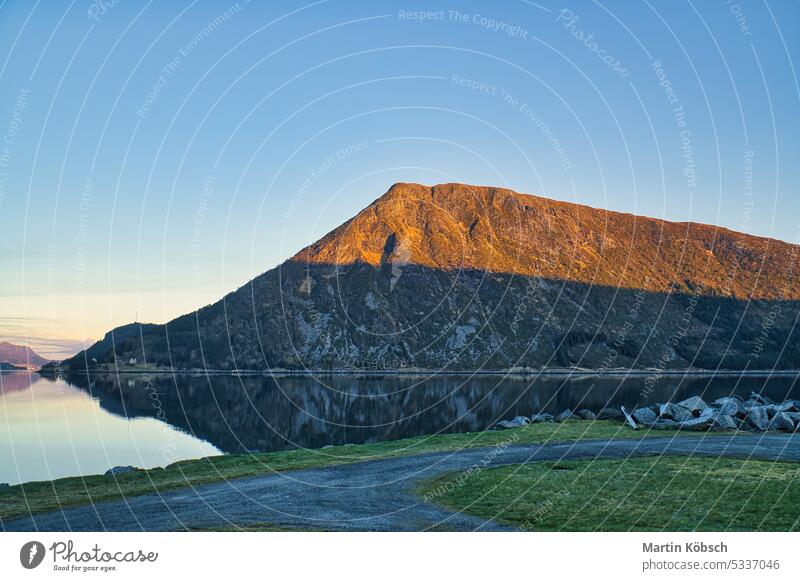 Fjord with view of mountains and fjord landscape in Norway. Landscape in Scandinavia sunset recreation nature wilderness panorama romantic nordic water fresh