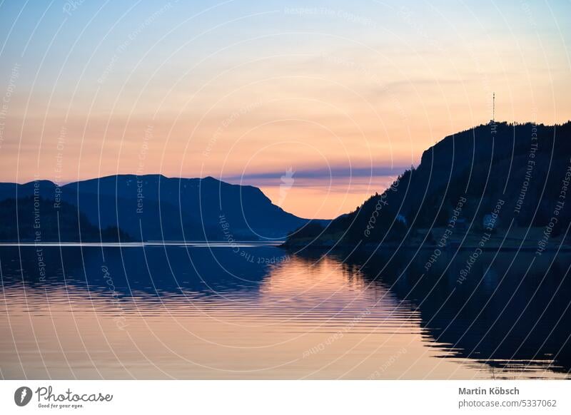 Fjord with view of mountains and fjord landscape in Norway. Landscape shot sunset recreation nature wilderness panorama romantic nordic water fresh relax