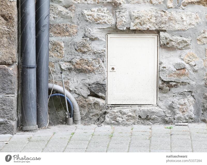 power box gray color Structures and shapes Plaster Box-shaped Energy Morbid Broken grey background Power consumption Energy industry Electrical circuit Deserted