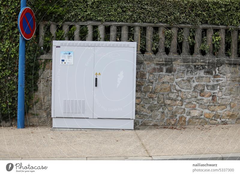 power box gray color Structures and shapes Plaster Box-shaped Energy Morbid Broken grey background Power consumption Energy industry Electrical circuit Deserted