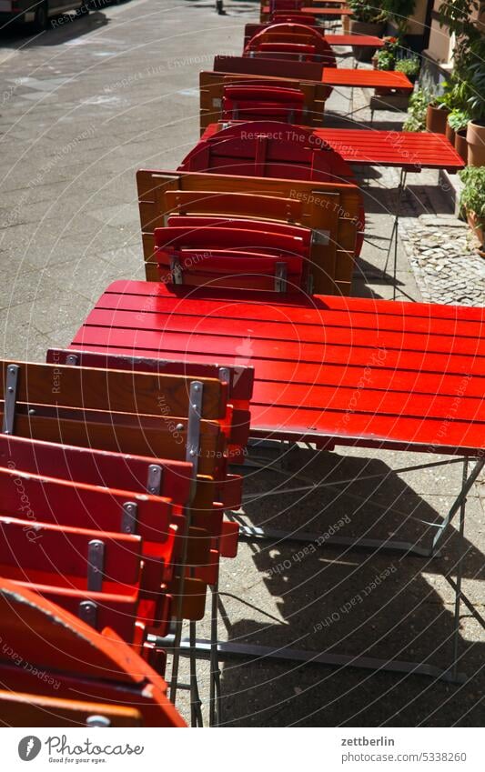 street cafe outside gastronomy Sidewalk Café Gastronomy off Closed Folding chair Folding table Furniture Furnishing Closing day closing day closing time Street