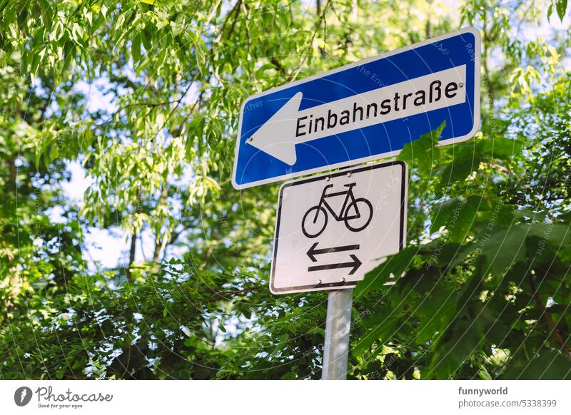 One way street sign and cyclist free sign One-way street Cyclists free Traffic sign Road sign Signs and labeling Signage Transport Road traffic Safety