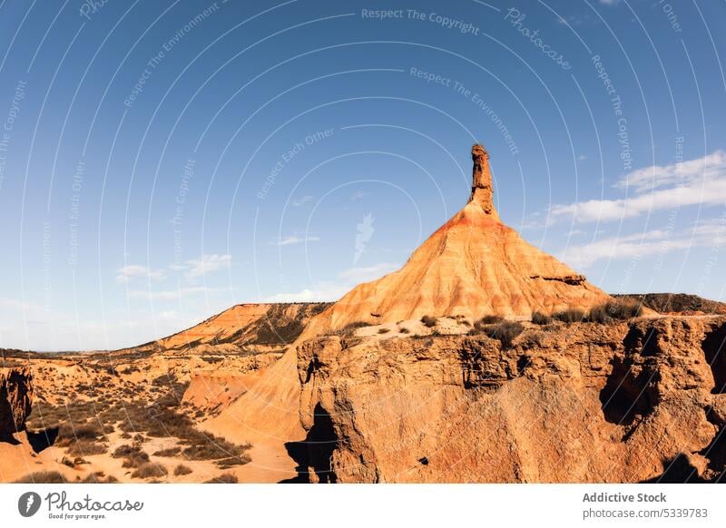 Desert landscape with rough stones desert rocky uneven formation mountain cliff nature surface geology dry sandstone environment valley arid drought barren