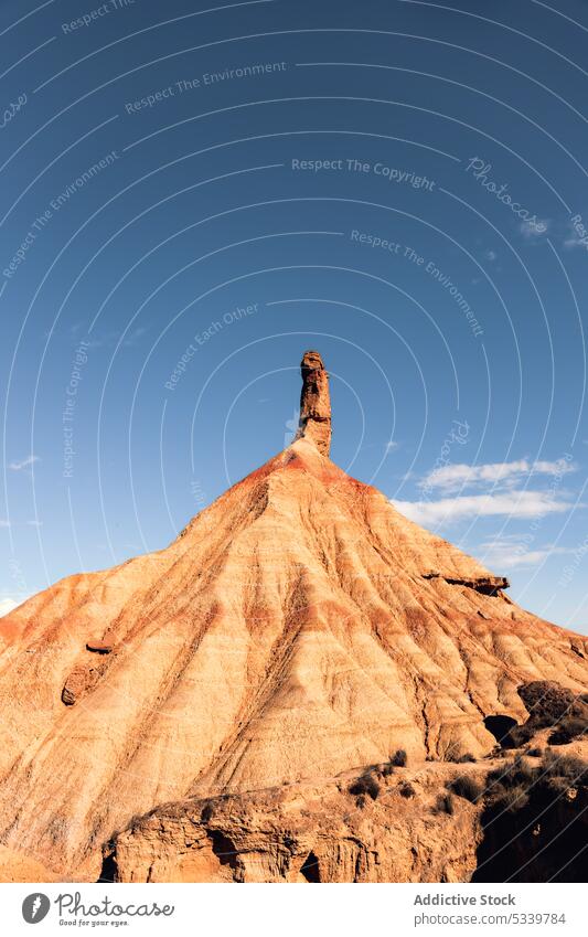 Desert landscape with rough stones desert rocky uneven formation mountain cliff nature surface geology dry sandstone environment valley arid drought barren