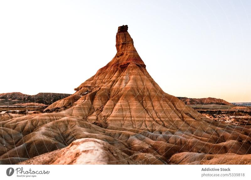 Desert landscape with rough stones desert rocky uneven formation mountain cliff nature surface geology dry sandstone environment valley arid drought barren