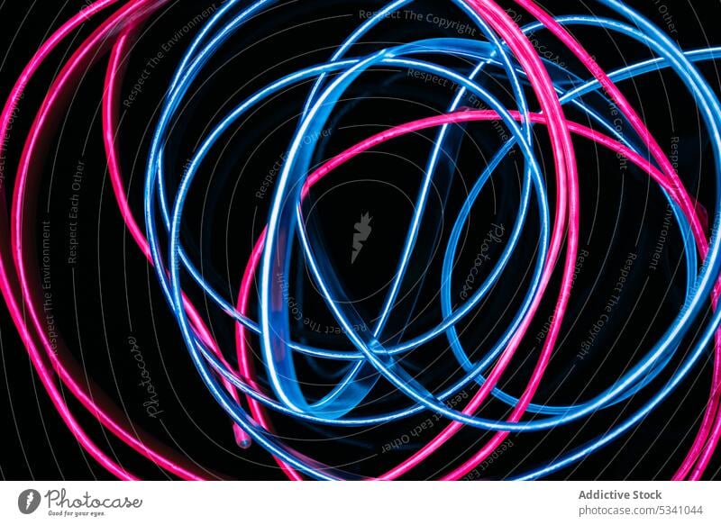 Stack of neon light tubes abstract art creative bright colorful beautiful connection curve line shape texture illustration image graphic concept blue pink