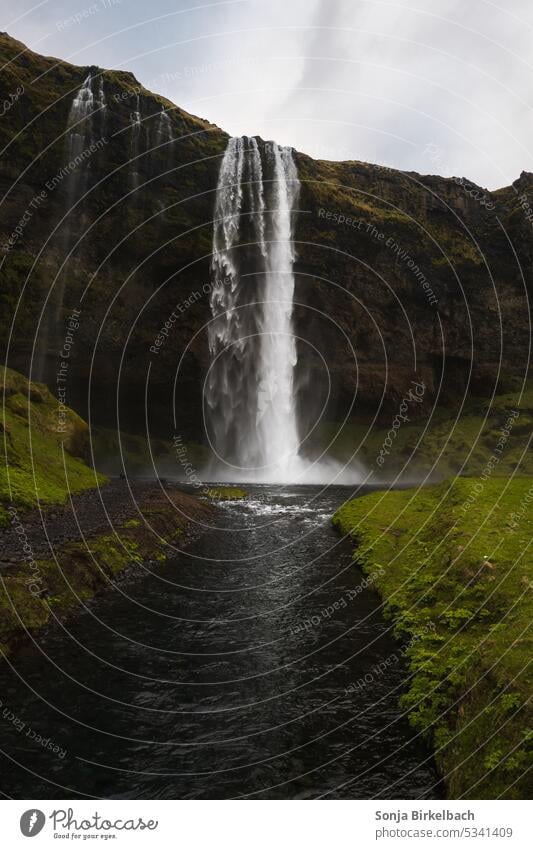 At the end of a waterfall...Seljalandsfoss on iceland seljalandsfoss cascade pool spectacular rock ring road outdoor outdoors river south iceland wind white