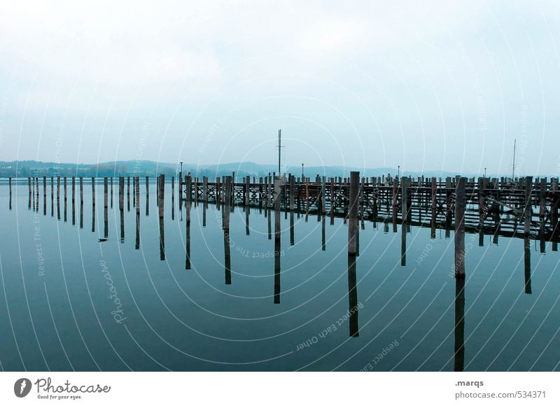 twilight Trip Adventure Environment Nature Landscape Water Sky Clouds Horizon Lake Lake Constance Footbridge Wooden stake Jetty Fresh Beautiful Blue Moody