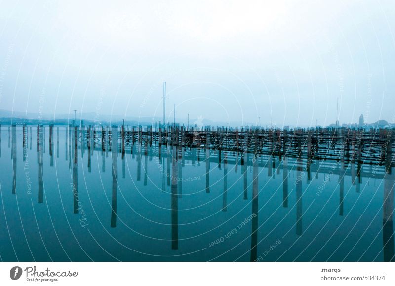 twilight Style Trip Environment Nature Elements Cloudless sky Lake Lake Constance Footbridge Wooden stake Jetty Exceptional Cold Blue Moody Esthetic Colour