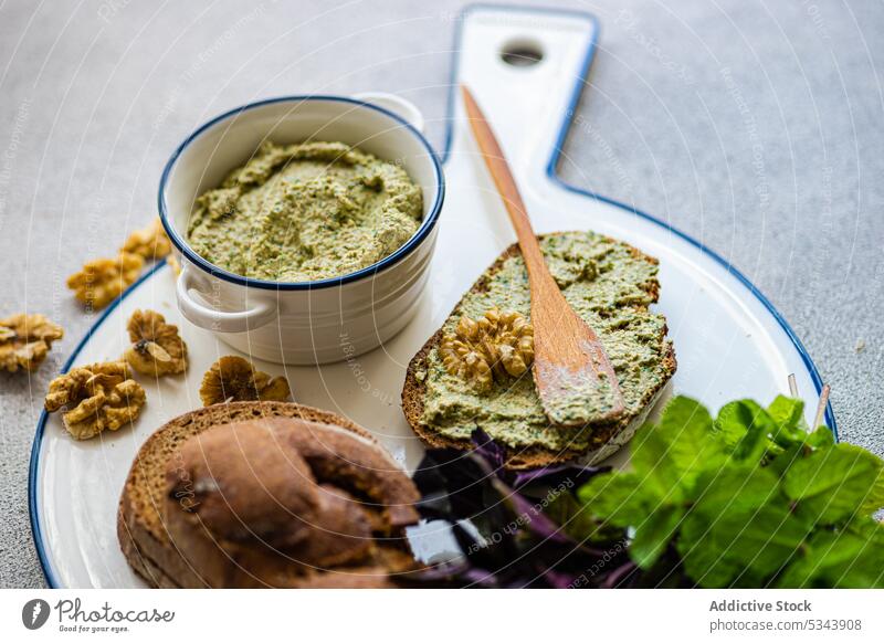 Healthy rye bread and walnut sauce Caucasus basil bowl breakfast cuisine cutting board eat eating food fresh georgia georgian healthy herb meal mint organic