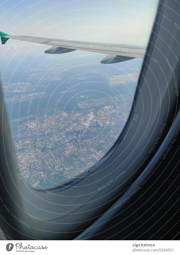 View through plane window Airplane Aviation Passenger plane Vacation & Travel In the plane Colour photo Flying Airplane takeoff View from the airplane Sky