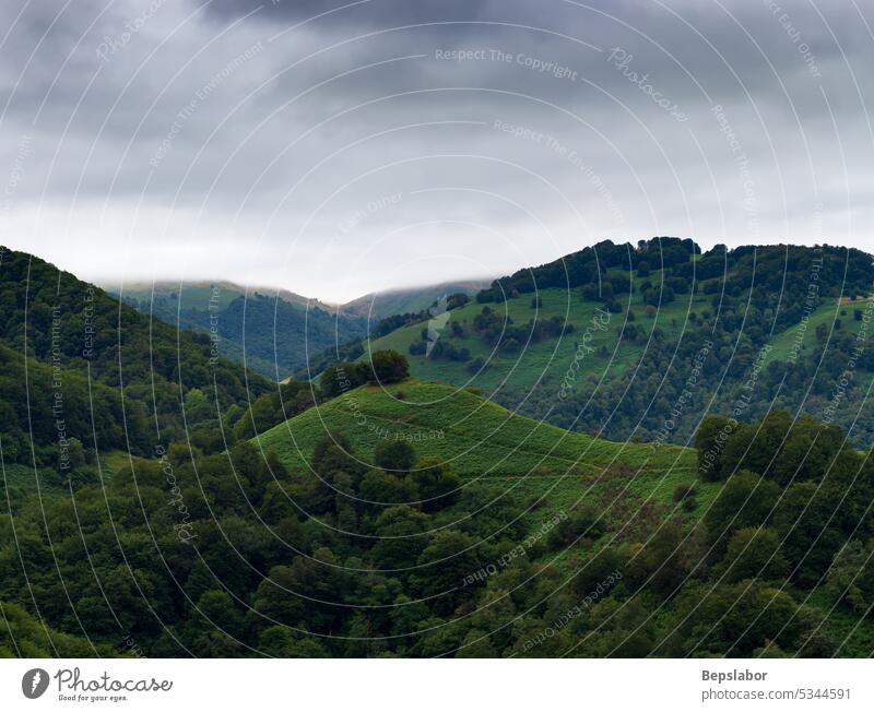 Mountain landscape, along the Way of Saint James. French Pyrenees hill scenery scenic france green nature sky french rural cloud valley peak hiking pilgrimage