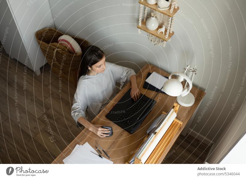 Teen girl at study desk in own room at home teen using creative gadget modern laptop online casual student schoolgirl connection device tablet computer