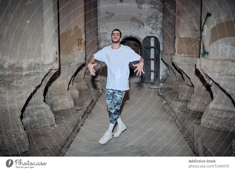 Male dancing in old building man break dance young grungy activity modern style motion action cool funky exercise male performance movement street handstand