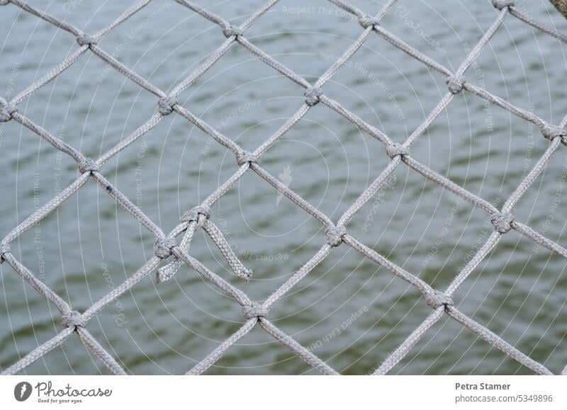 Catch net with knots Catching net Net Knot Node Rope String Exterior shot Colour photo Deserted Detail Structures and shapes Pattern Close-up fishing