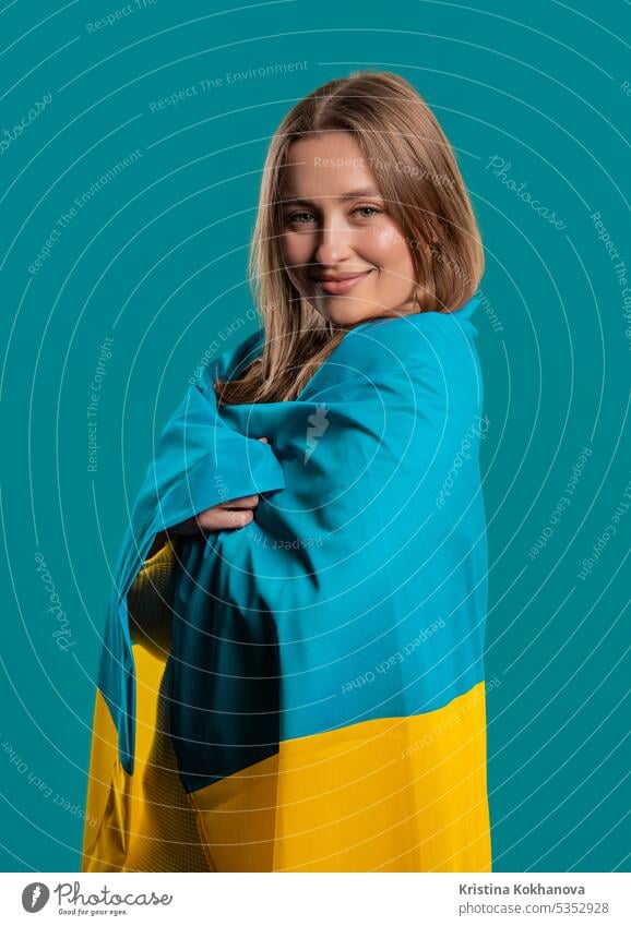 Happy woman with national Ukrainian flag on blue. Ukraine, patriot, victory war african american independence patriotic wind patriotism symbol happy millenial