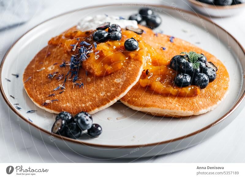 Homemade American Pancakes pancake american maple breakfast stack plate honey pile pancakes food meal fresh jam blueberries sweet dessert homemade lunch morning