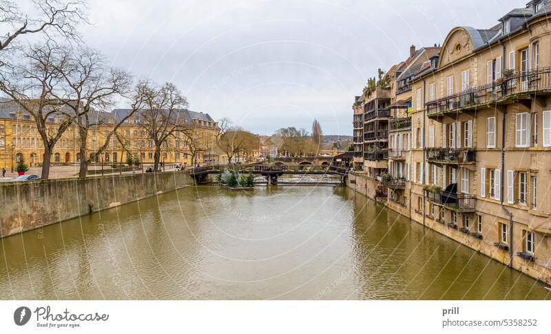 Metz in France metz lorraine france city moselle river seille architecture building culture tradition old historic bridge street wall stone wall facade