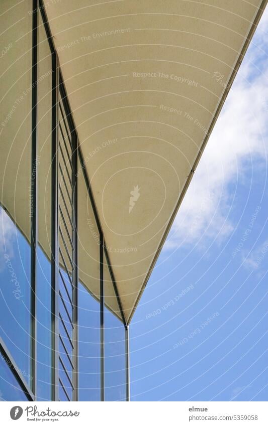 roof reflected in glass facade against blue sky from frog perspective reflection Roof roof area structure Geometry Glass front Structures and shapes Reflection