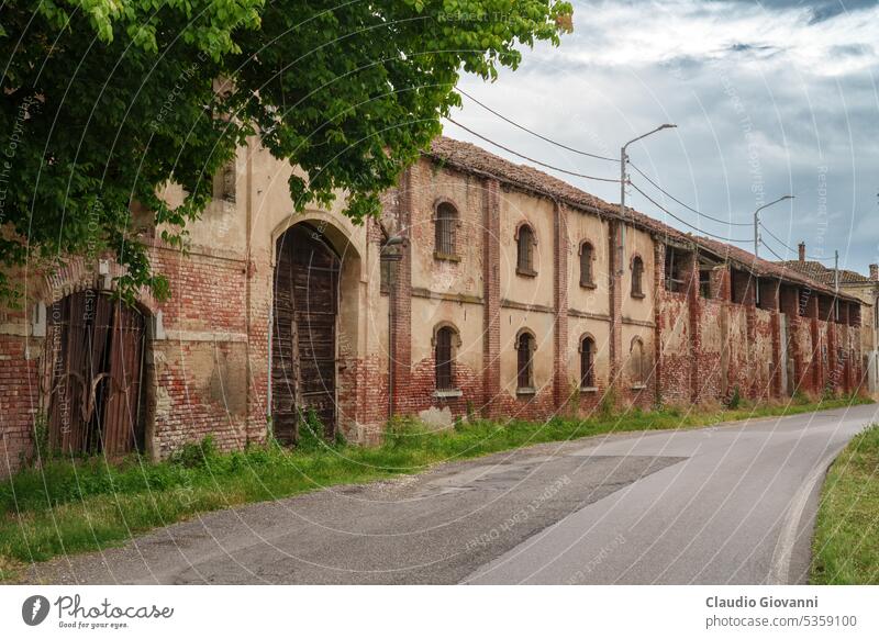 Carpignago, historic rural village in Pavia province, Italy Europe Lombardy architecture building color country day exterior farm house old outdoor photography