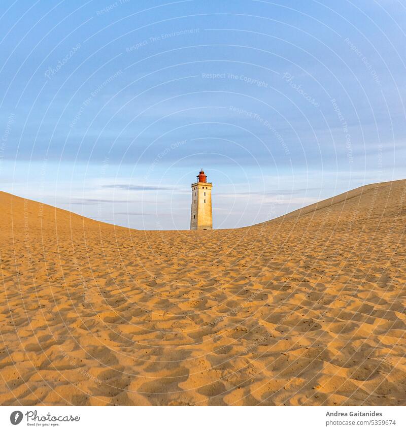 Rubjerg Knude lighthouse centered between two dune hills, slightly cloudy sky, 1:1, square duene sand dune Sand Wanderdüne Rubjerg Knude shifting dune