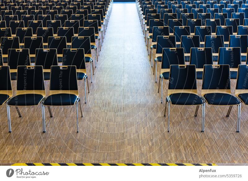 One against many | juxtaposition Auditorium Deserted Colour photo Hall seats chairs Seating Concert Hall Row of seats Row of chairs Seating capacity